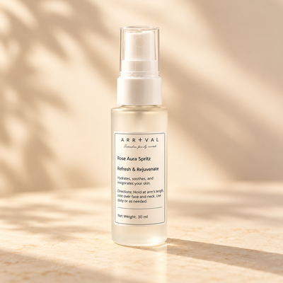 Arrival Rose Aura Spritz facial mist in a styled product scene