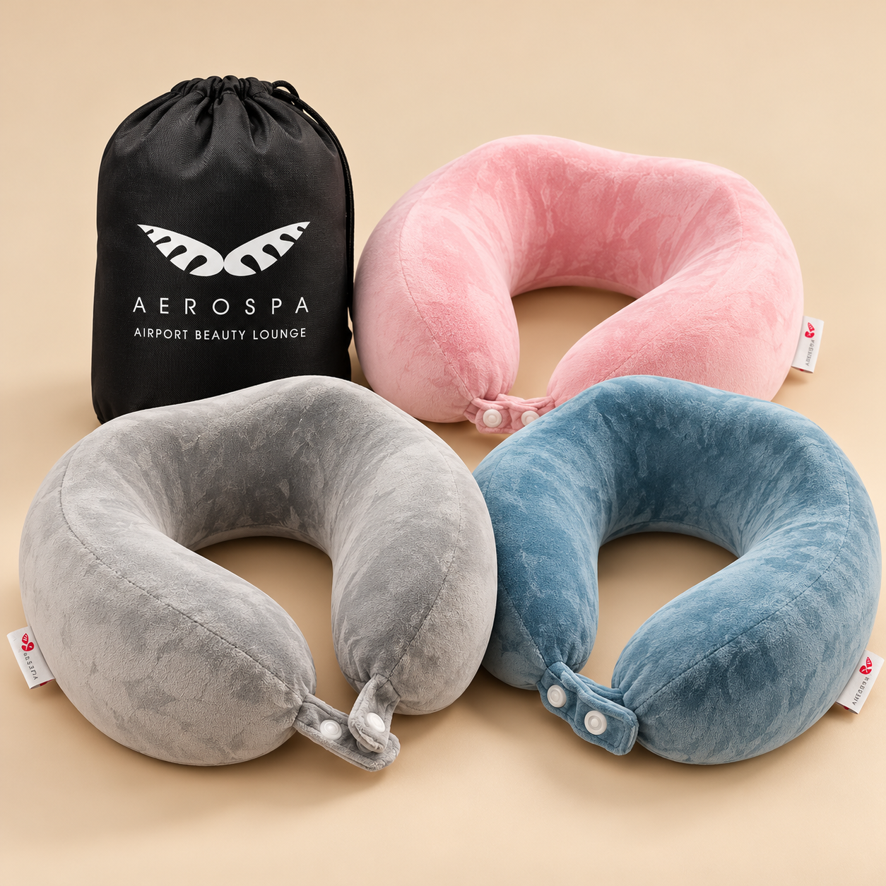 AeroSpa memory foam travel neck pillows in grey, pink and turquoise